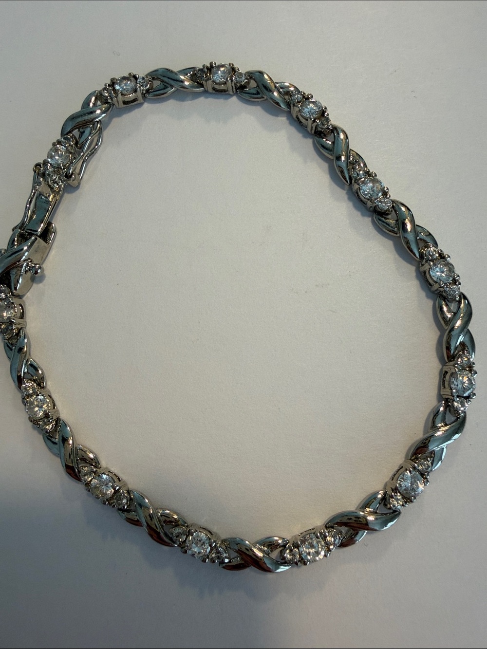 Twisted Sterling Silver Link Bracelet with Sparkling Accents